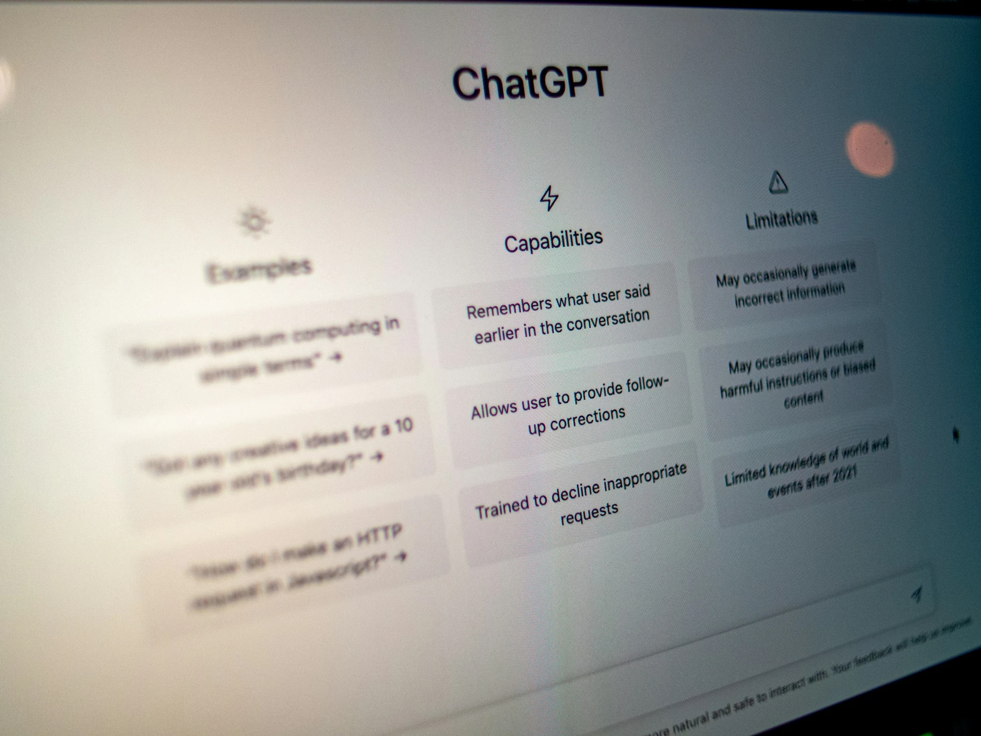 An AI chat assistant open on a laptop in a bright workspace