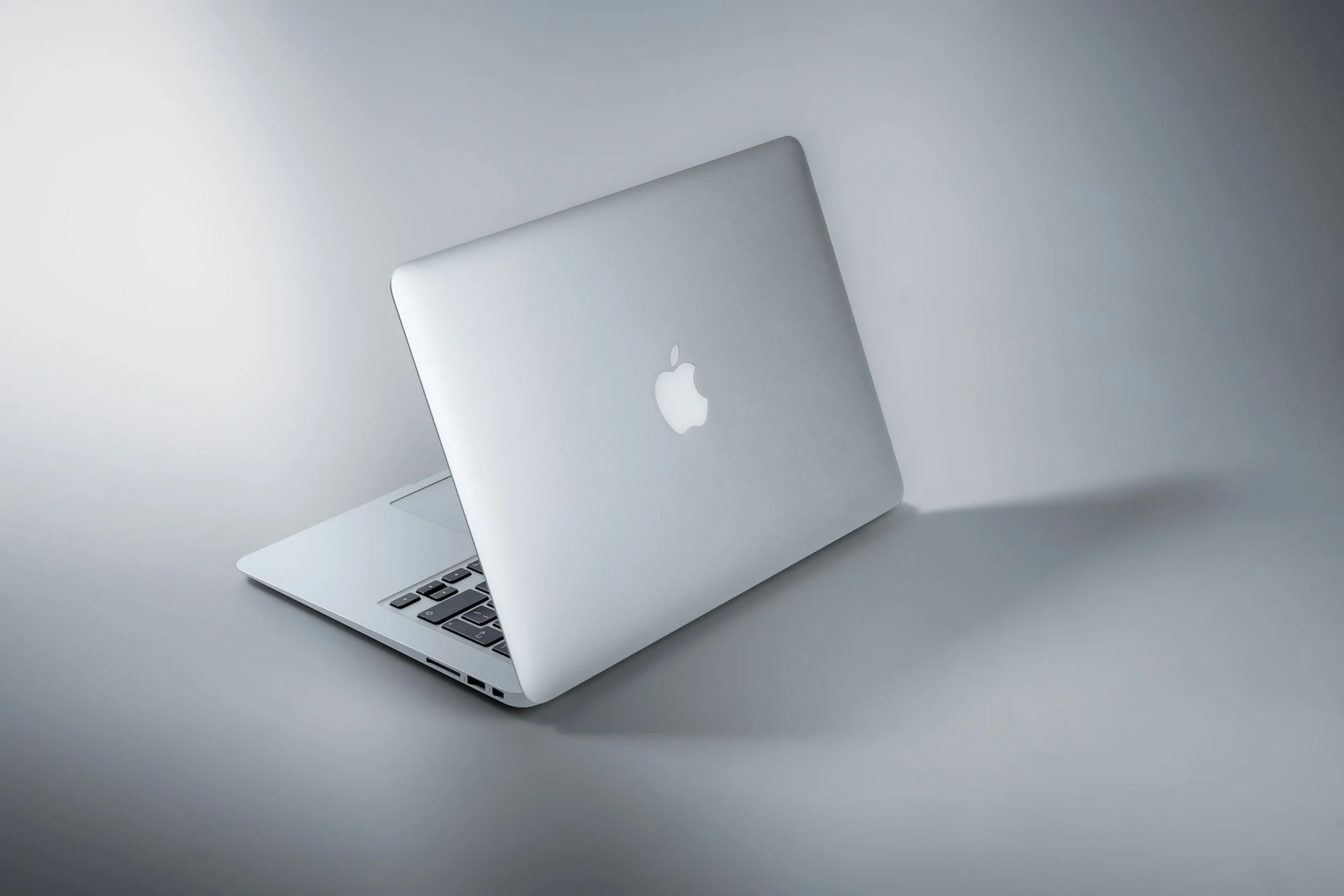 A silver laptop on a desk