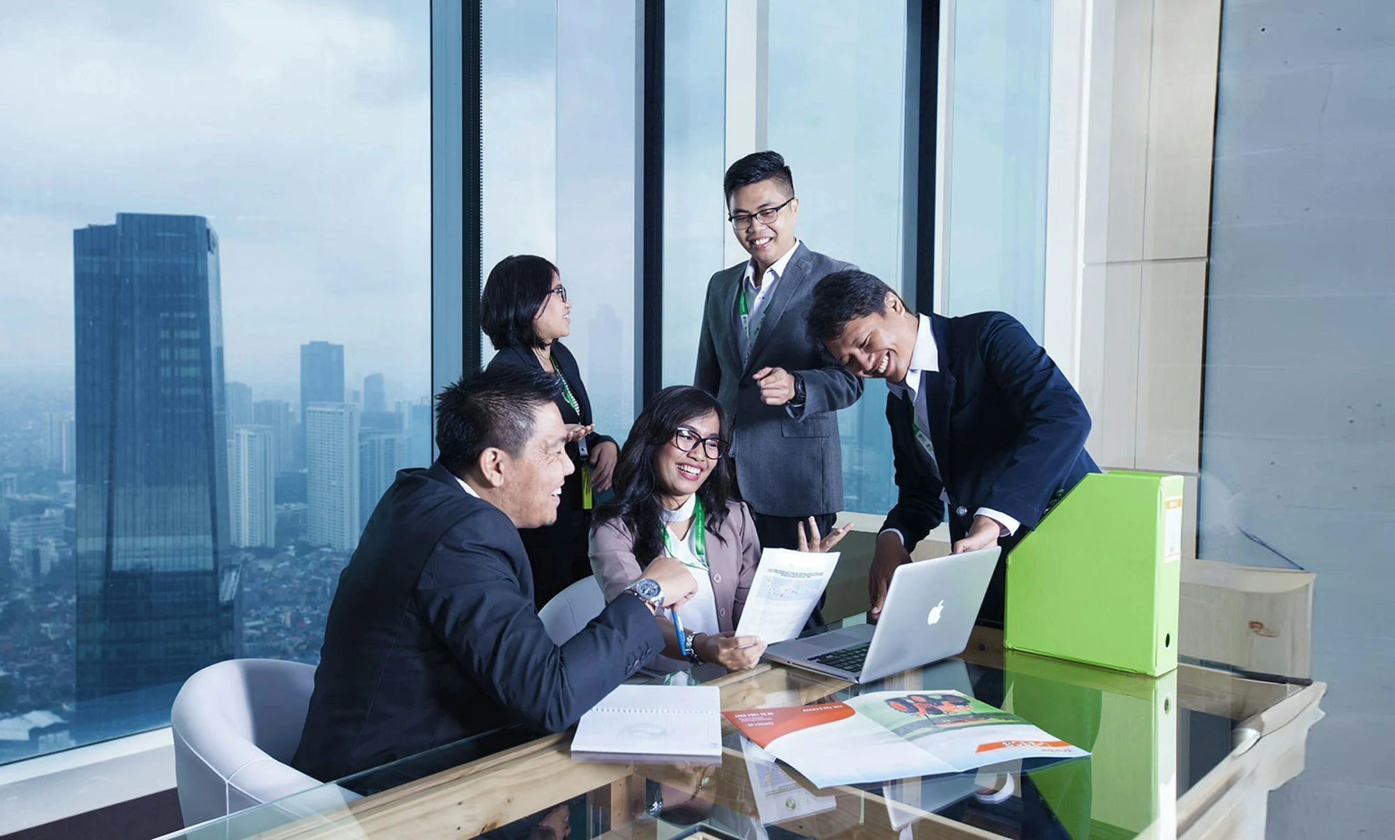 A client session in a glass office overlooking the city