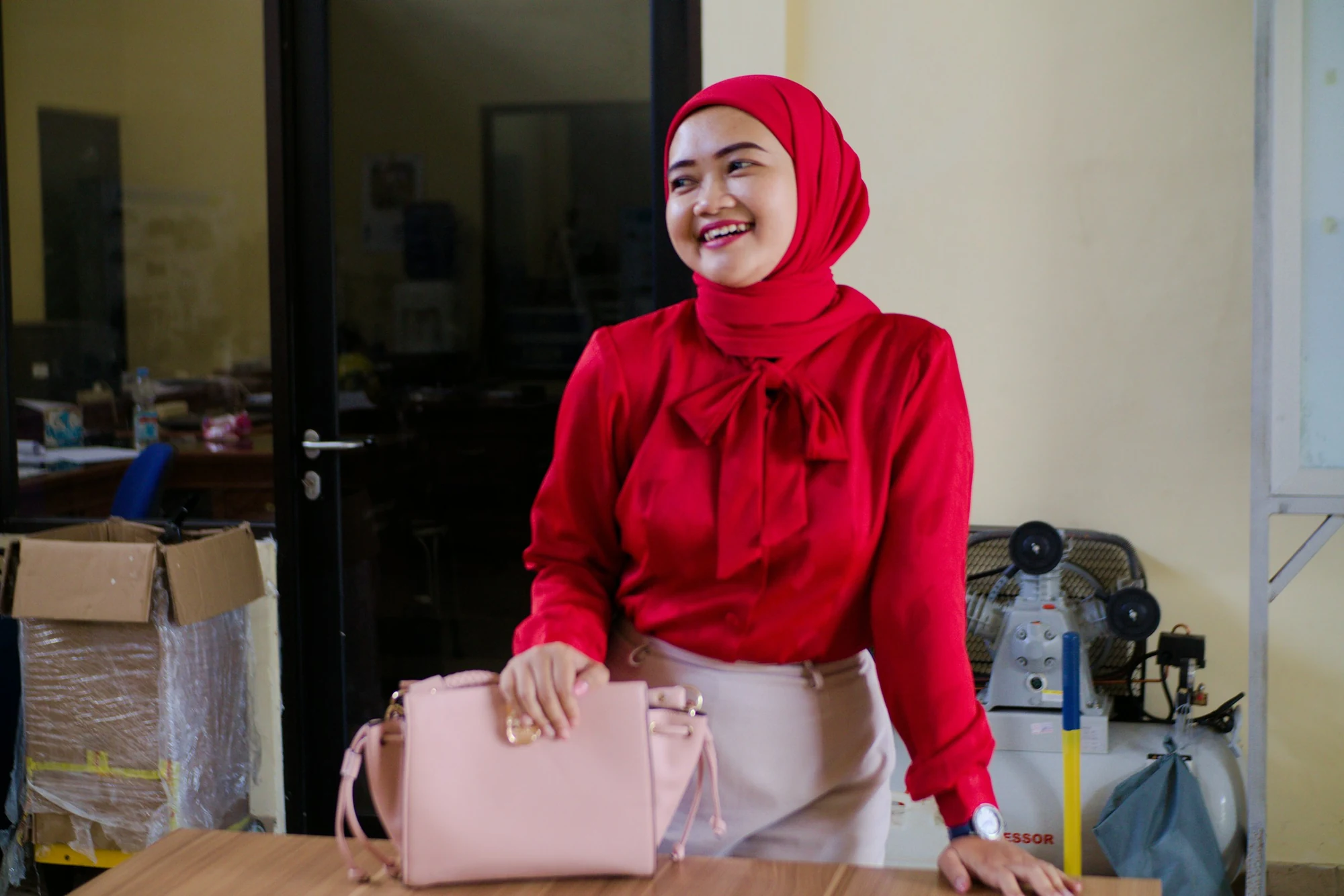 A smiling team member in the office