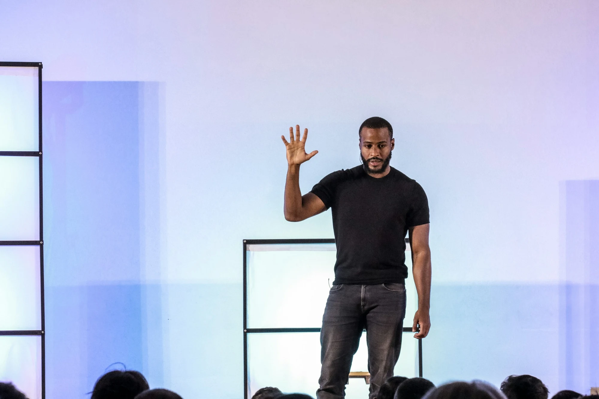 A speaker presenting on a light stage